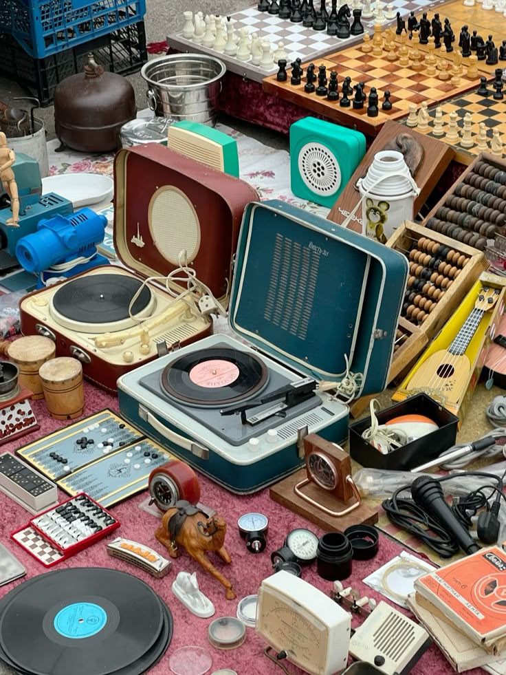 Vintage objects arranged closely on a flea market table